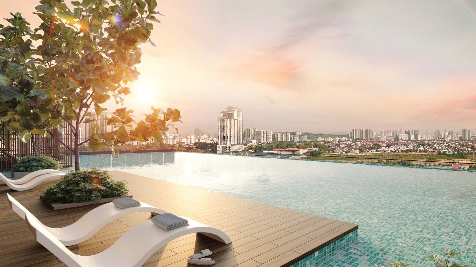 OAKA Residences pool at sunset